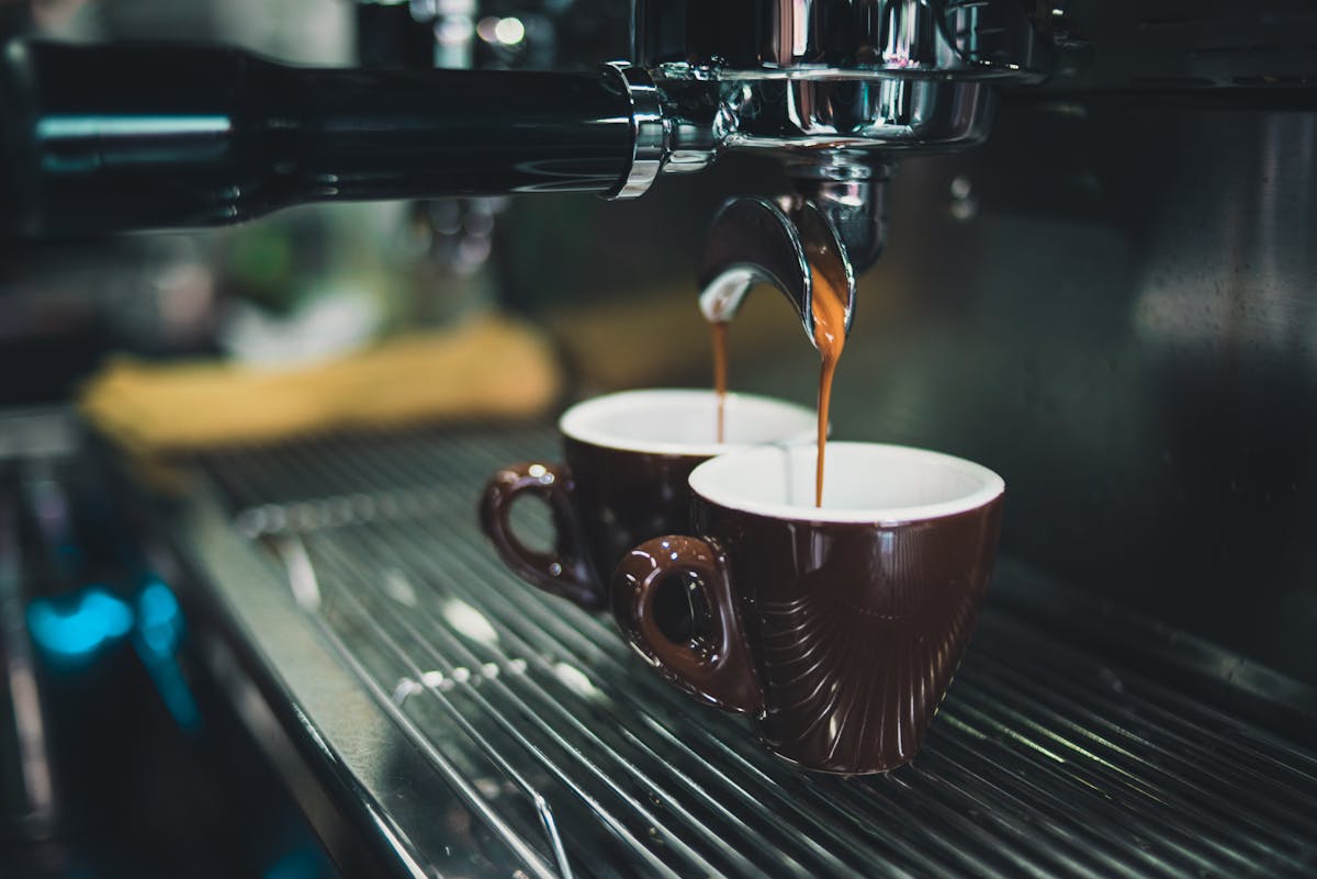 Small espresso cup on saucer at a Naples coffee bar counter
